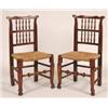 Image 1 : A Harlequin Set of Seven Spindle Back Dining Chairs, with rush seats, (7)  See illustration (part...