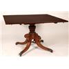 Image 1 : An Early 19th Century Mahogany Breakfast Table, the rectangular top on a reeded baluster column a...