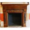 Image 1 : A Victorian Oak Fireplace, the moulded cornice above a frieze carved swags, flanked by corinthian...