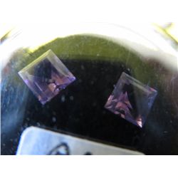 2 square cut matched amethysts.
