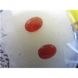 Pair of matched faceted carnelian agates