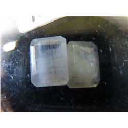 2 rectangular emerald cut moonstones.