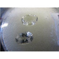 2 oval cut clear topaz.. 6mm long