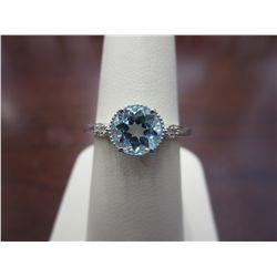 Blue Topaz ring with 2 shoulder Diamonds