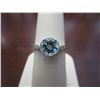 Image 1 : Blue Topaz ring with 2 shoulder Diamonds
