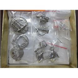 Nine sterling silver charms