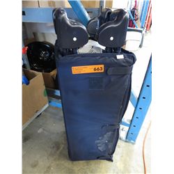 Collapsible playpen in carrying case.