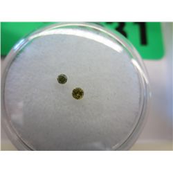 Two round cut fancy yellow diamonds