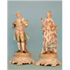 Image 1 : An Impressive pair of German porcelain figures of maiden and gallant, each floral-encrusted and w...