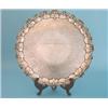 Image 1 : A George III silver salver with ornate rococo border and later floral-engraved centre and Victori...