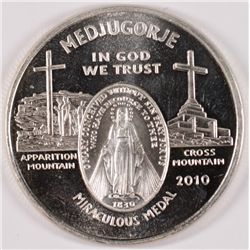 ONE OUNCE .999 SILVER ROUND FEATURING MEDJUGORIE 2010  VERY NICE!