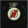 Image 1 : Adam Larsson Signed Devils Logo Puck (JSA COA)