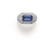 Image 1 : A SAPPHIRE AND DIAMOND RING The rectangular-cut sapphire weighing approximately 2.70 carats to th...