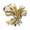 Image 1 : A GOLD AND DIAMOND BROOCH Of scroll and ribbon design, enhanced with brilliant-cut diamonds, moun...