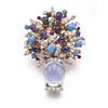 Image 1 : BULGARI A MULTI-GEM JARDINIERE BROOCH The flowers composed of sapphire and turquoise cabochons an...