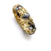 Image 1 : BULGARI A GOLD AND BLACKENED GOLD BRACELET The flexible band composed of alternating 18K gold and...