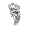 Image 1 : Property of a European estate A DIAMOND BROOCH Of scroll and cascade design, set with marquise, p...