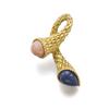 Image 1 : BOUCHERON A GOLD, CORAL AND LAPIS LAZULI BROOCH Designed as an 18K gold bark-textured scroll, wit...