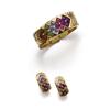 Image 1 : BULGARI A SET OF GOLD AND COLORED STONE JEWELRY Comprising a bracelet, the front enhanced with ch...