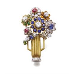 A GOLD AND GEM-SET JARDINIERE BROOCH The flowers and foliage composed of vari-shaped diamonds, ru...