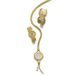 DELANEAU A GOLD AND DIAMOND PENDANT WATCH The octagonal-shaped dial pave-set with diamonds to the...