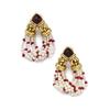 Image 1 : BULGARI A PAIR OF GOLD, AMETHYST, CULTURED PEARL AND RUBY EARCLIPS Each designed as a twisted cul...