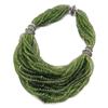 Image 1 : KATIA VITA A PERIDOT AND DIAMOND BIB NECKLACE The front, composed of 25 strands of graduated peri...