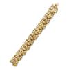 Image 1 : Property of a European estate A GOLD AND DIAMOND BRACELET The flexible band, designed as a series...