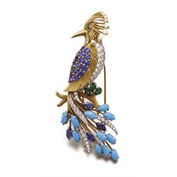 A GOLD, AND GEM-SET BIRD BROOCH Modeled as a bird of paradise, the body pave-set with diamonds, t...