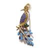 Image 1 : A GOLD, AND GEM-SET BIRD BROOCH Modeled as a bird of paradise, the body pave-set with diamonds, t...