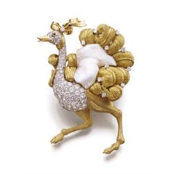 A GOLD, PEARL AND DIAMOND BIRD CLIP BROOCH Modeled as an ostrich, the body pave-set with brillian...