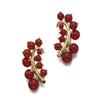 Image 1 : SEAMAN SCHEPPS A PAIR OF GOLD AND CARNELIAN EARCLIPS Each designed as a stylized feather, set wit...