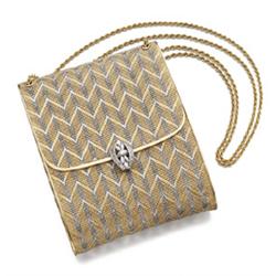 A GOLD AND DIAMOND EVENING BAG The rectangular-cut shaped yellow and white woven 18K gold evening...
