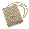 Image 1 : A GOLD AND DIAMOND EVENING BAG The rectangular-cut shaped yellow and white woven 18K gold evening...