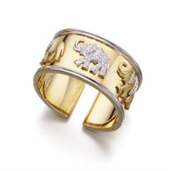 A GOLD AND DIAMOND BANGLE The hinged gold bangle, designed as a band enhanced by three sculpted e...