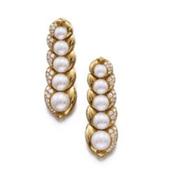 BULGARI A PAIR OF GOLD AND CULTURED PEARL EARCLIPS Each designed as a graduated line of five cult...