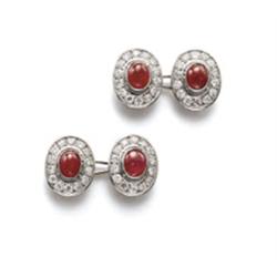 Property of a Lady A RUBY AND DIAMOND DRESS-SET Comprising a pair of cufflinks, designed as oval ...