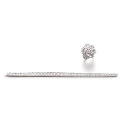 Property of a Lady A DIAMOND LINE BRACELET AND A DIAMOND RING The bracelet, set with graduated br...