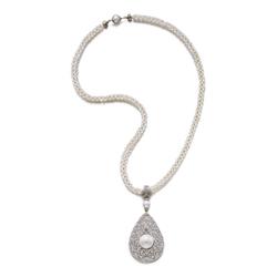 Jewels from a Private Collection A NATURAL PEARL, CULTURED PEARL AND DIAMOND PENDANT NECKLACE The...
