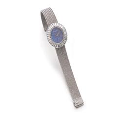 VACHERON & CONSTANTIN A WHITE GOLD, DIAMOND AND OPAL LADY'S WRISTWATCH Designed as an oval-shaped...