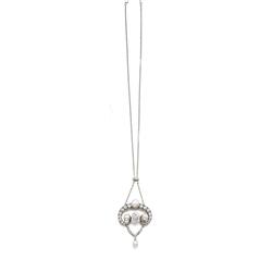 A BELLE EPOQUE DIAMOND AND NATURAL PEARL PENDANT CHAIN The openwork plaque, set with a natural bo...