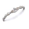 Image 1 : Jewels from a Private Collection A WHITE GOLD, COLORED DIAMOND AND DIAMOND BRACELET The front des...