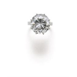 Property of a lady of title A SINGLE STONE DIAMOND RING The brilliant-cut diamond weighing 19.61 ...