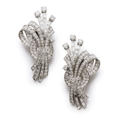 Property of a Lady A PAIR OF DIAMOND CLIPS Each designed as a stylized flower bouquet, set throug...