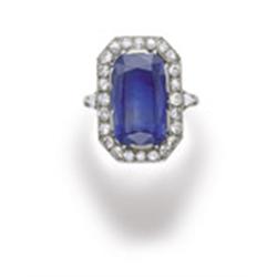 A SAPPHIRE AND DIAMOND RING Designed as a rectangular-cut sapphire weighing approximately 10.80 c...