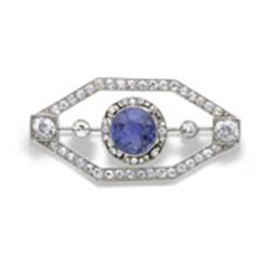 A SAPPHIRE AND DIAMOND BROOCH Designed as an octagonal openwork plaque set with old European and ...