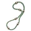 Image 1 : AN EMERALD, DIAMOND AND BLACK ENAMEL NECKLACE Designed as a strand of emerald beads, interspersed...