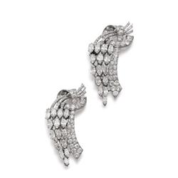 Property of a Lady A PAIR OF DIAMOND CLIPS Each of ribbon and cascade design, set with circular, ...