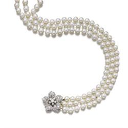 A CULTURED PEARL AND DIAMOND NECKLACE Designed as three rows of cultured pearls to the clasp desi...