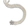 Image 1 : A CULTURED PEARL AND DIAMOND NECKLACE Designed as three rows of cultured pearls to the clasp desi...